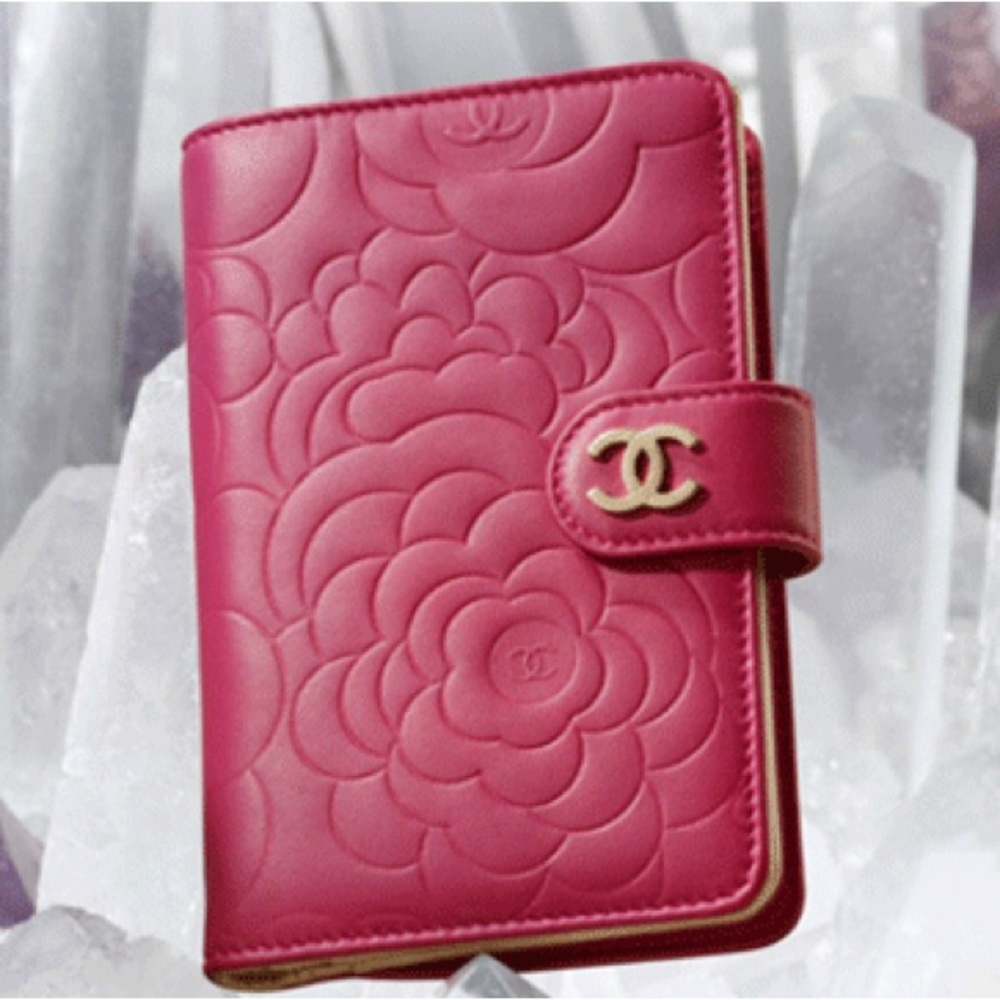 SOLD!! CHANEL Camellia Embossed Lambskin Zip Wallet in Fuchsia with LGHW